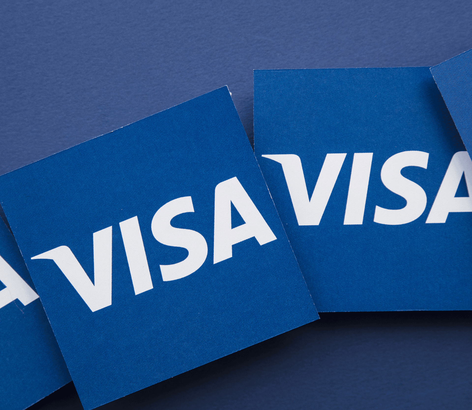 VISA logos on blue background on subscription and recurring payments guidelines