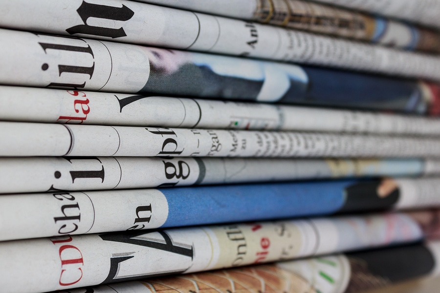 Colorful stack of folded newspapers