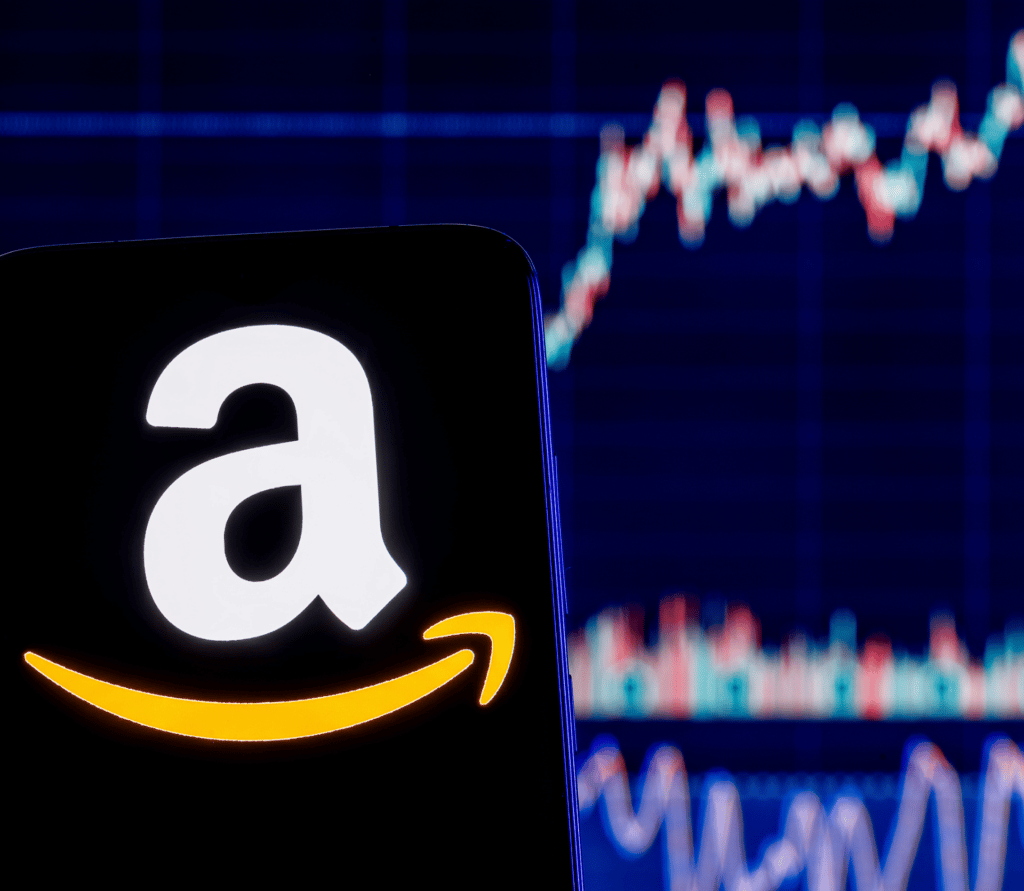 Amazon logo on top of stock market chart