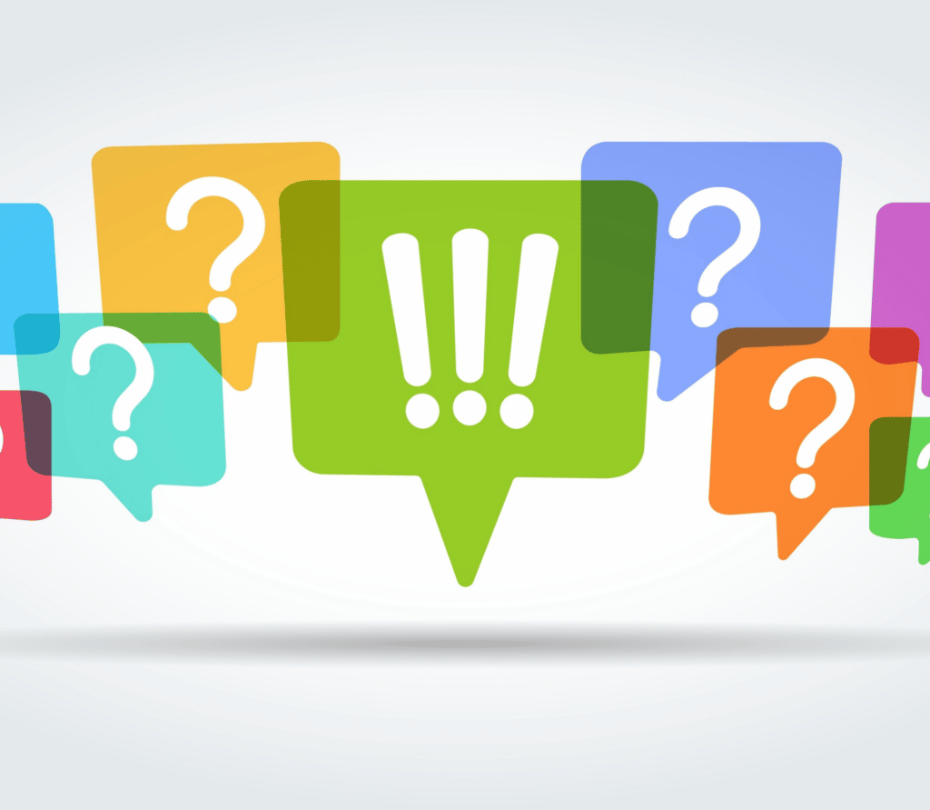 Question marks and exclamation points on multi-colored conversation bubbles on light gray background