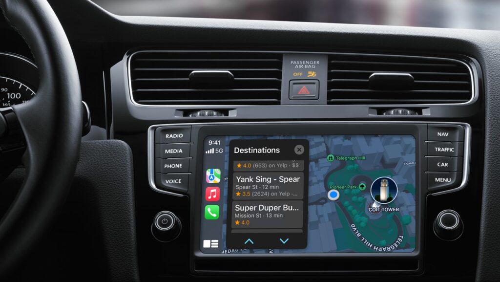 Maps feature displayed via Apple CarPlay in a vehicle with a black dashboard