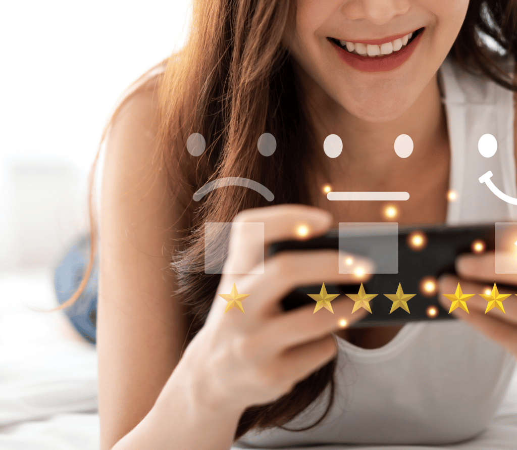 Satisfied customer types review on smartphone