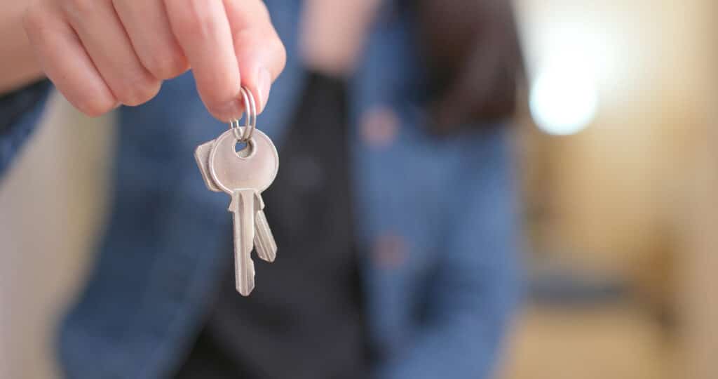 Woman holding key