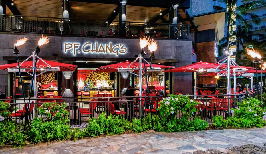 Outside view of P. F. Chang's with outdoor seating on two levels.