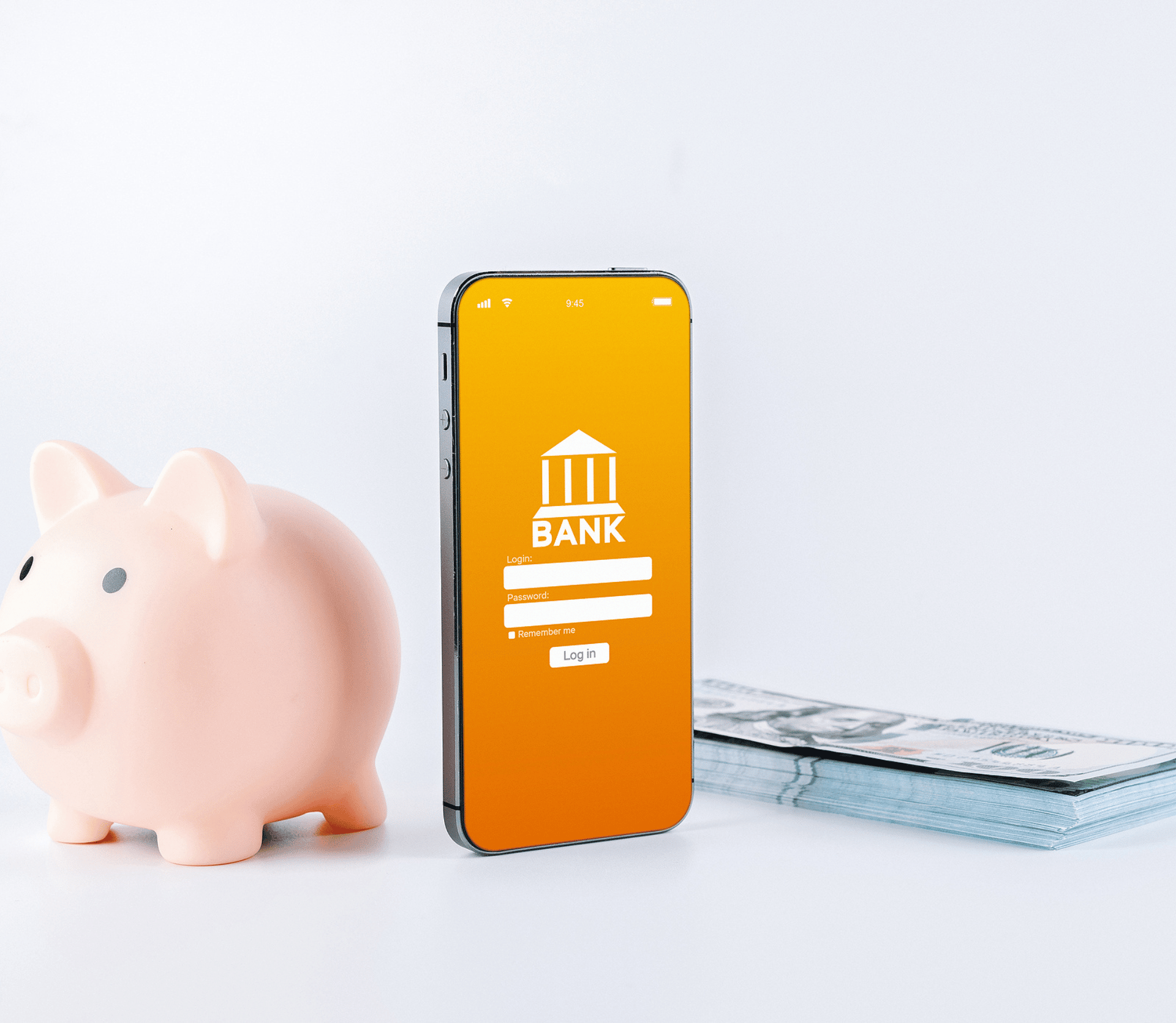 Piggy bank, mobile app and stack of 100s in US dollars