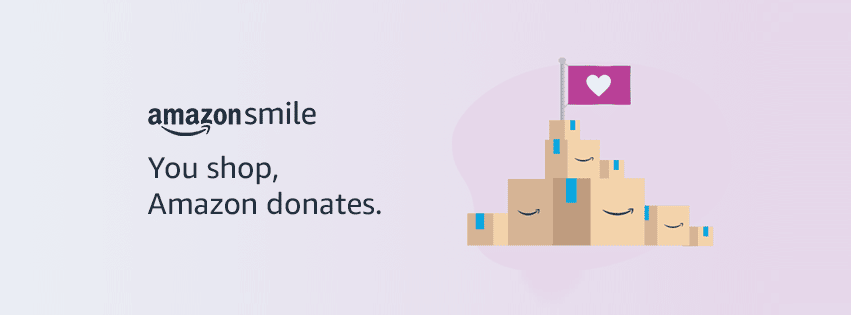 AmazonSmile hero that says "You shop, Amazon donates" on a light pink background, next to an illustration of Amazon boxes stacked on top of each other with a flag with a heart on top of the pile.