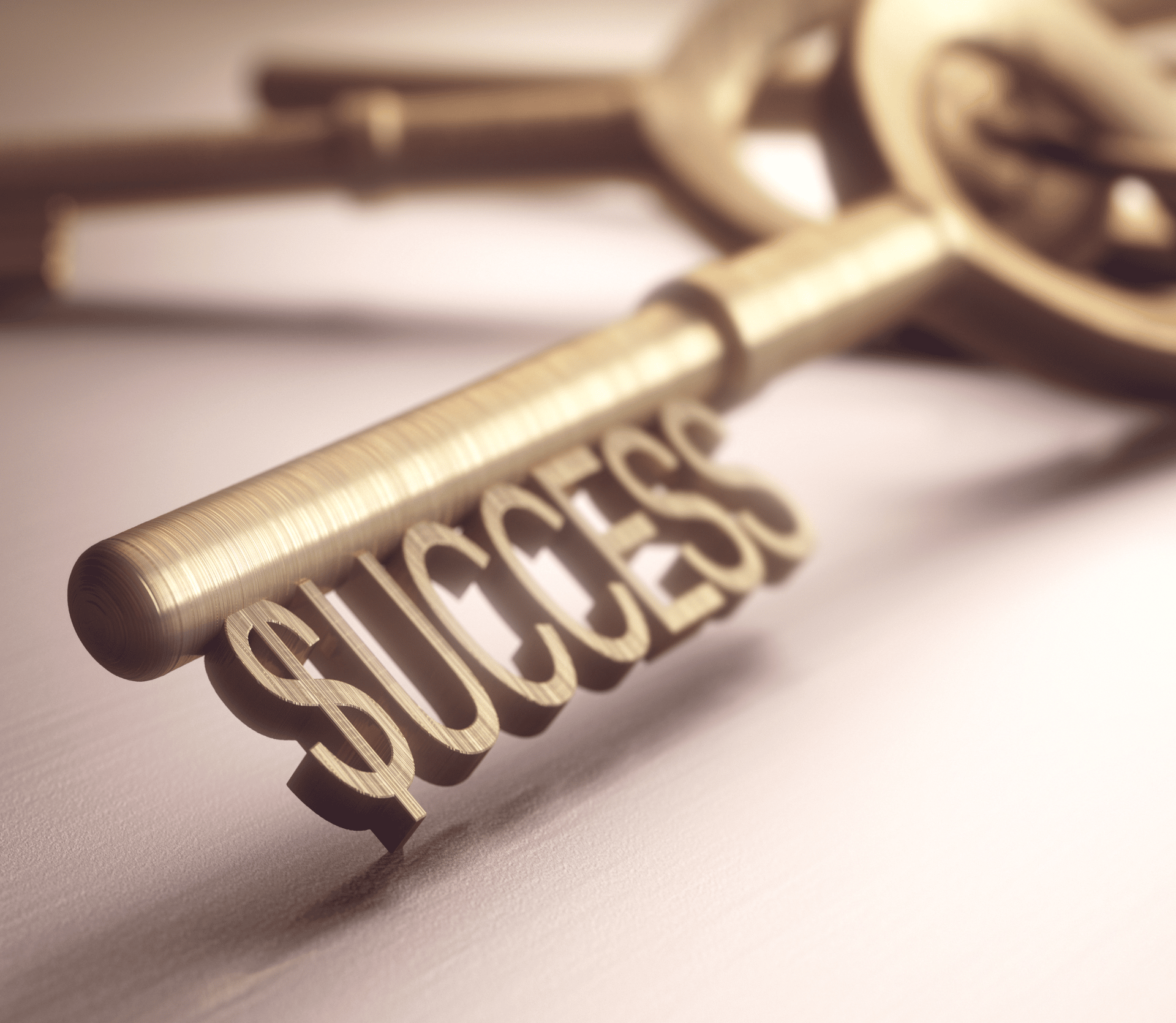 Gold key with the word Success at the end - key to unlock recurring revenue success