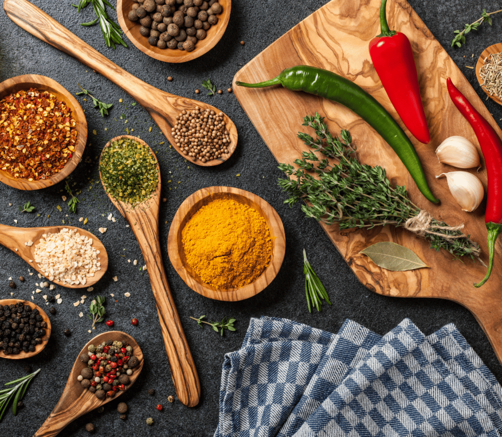 Cooking table with spices and herbs