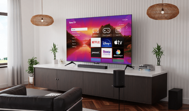 Roku Smart TV with Roku dashboard displayed on a cabinet in a modern living room