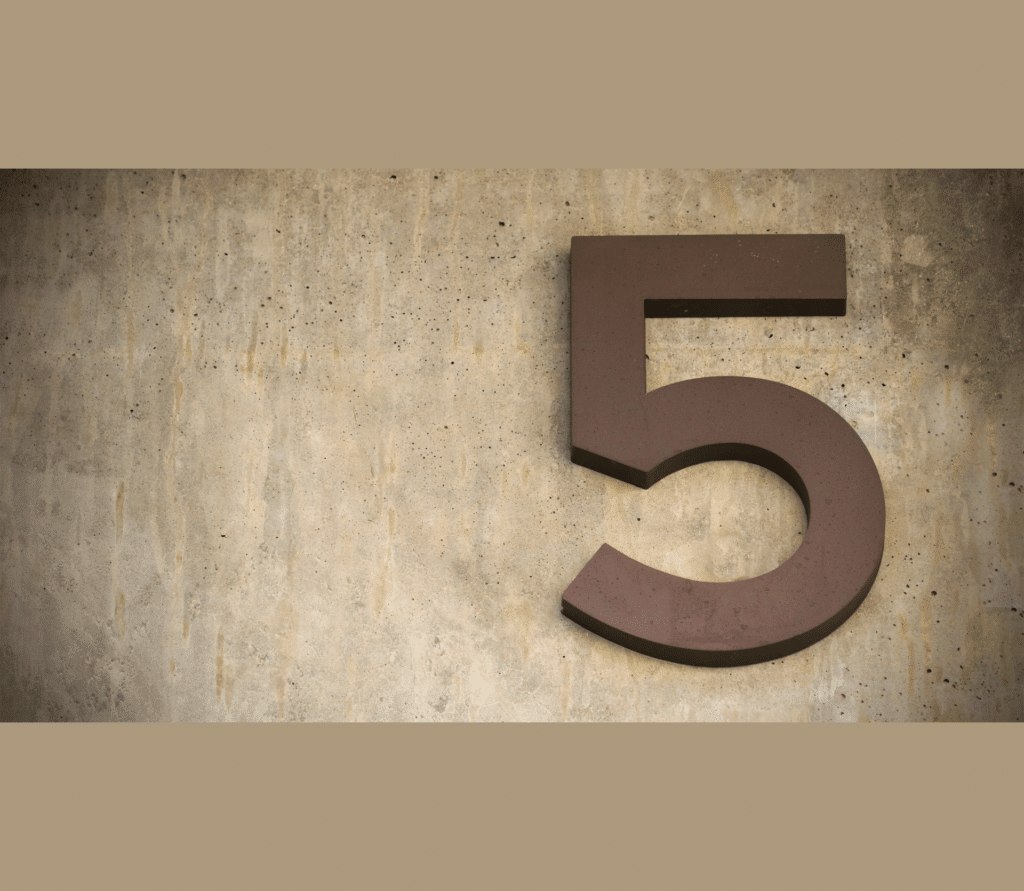Brown number 5 on wood grain background.