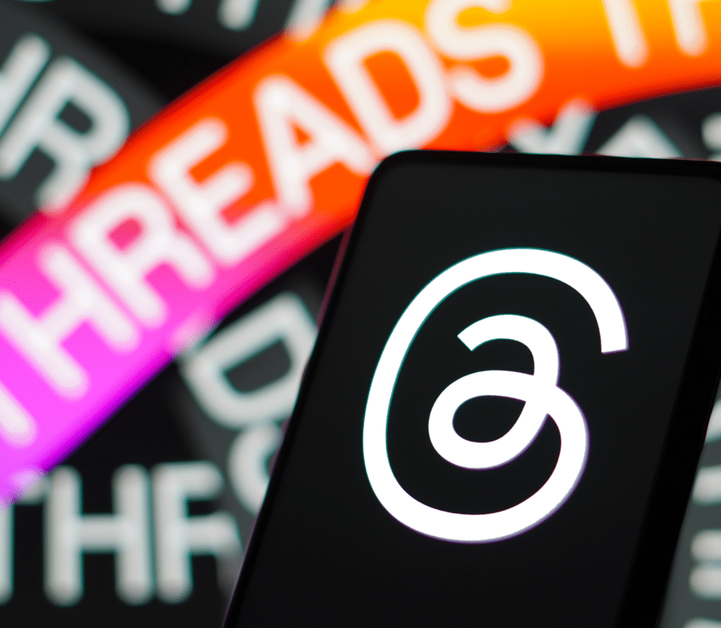 Social media app Threads logo displayed on smartphone