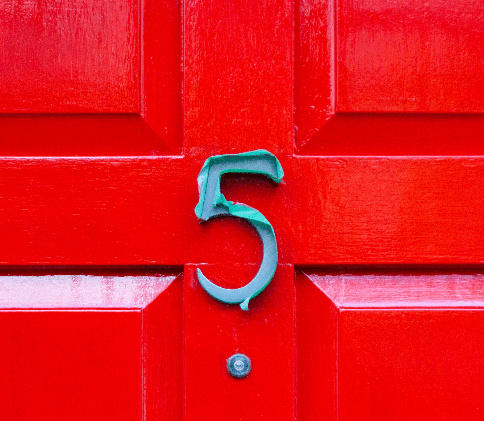 Green 5 on bright red door